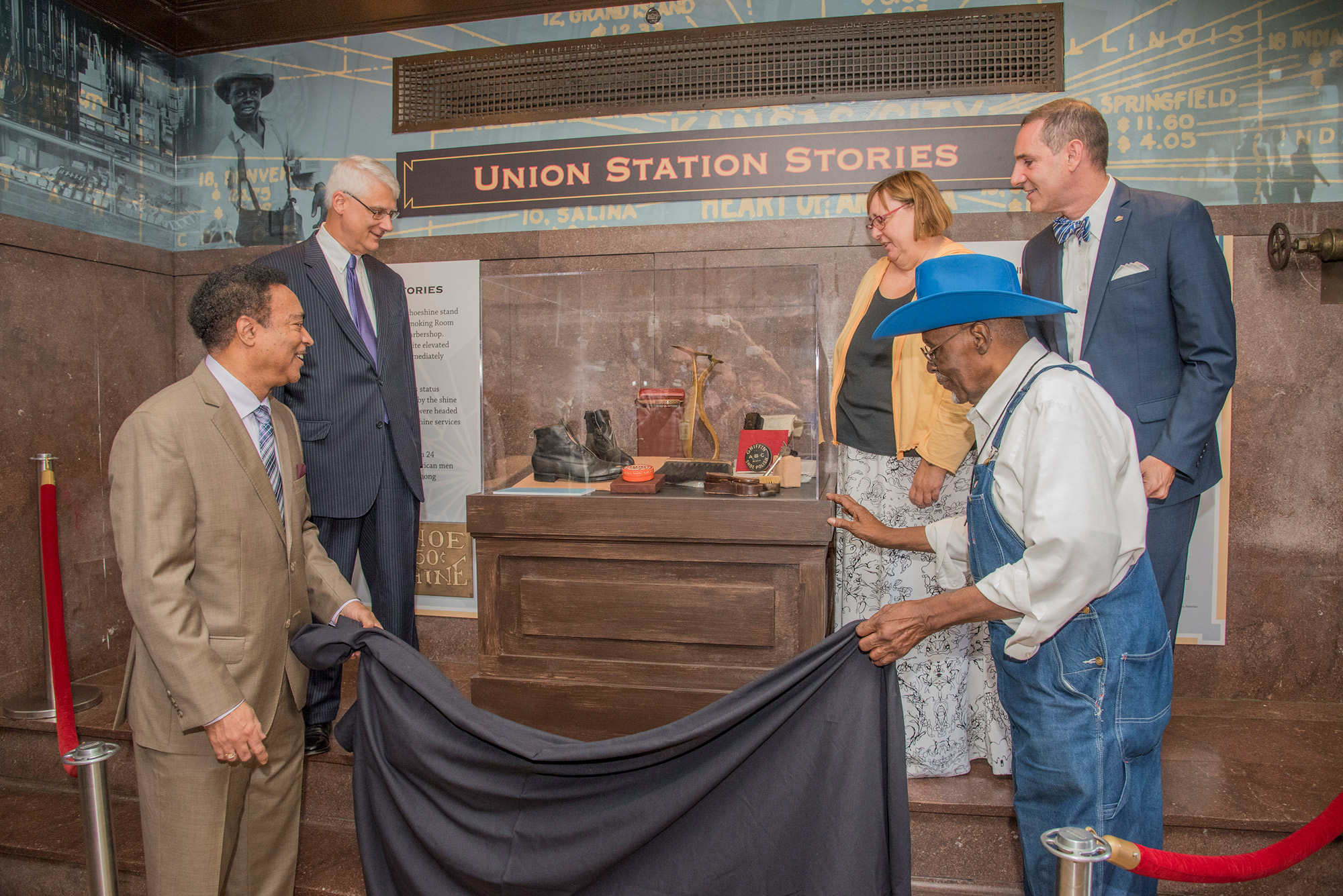 the grand opening of the shoe shiner exhibit at Union Station's Kansas City art gallery