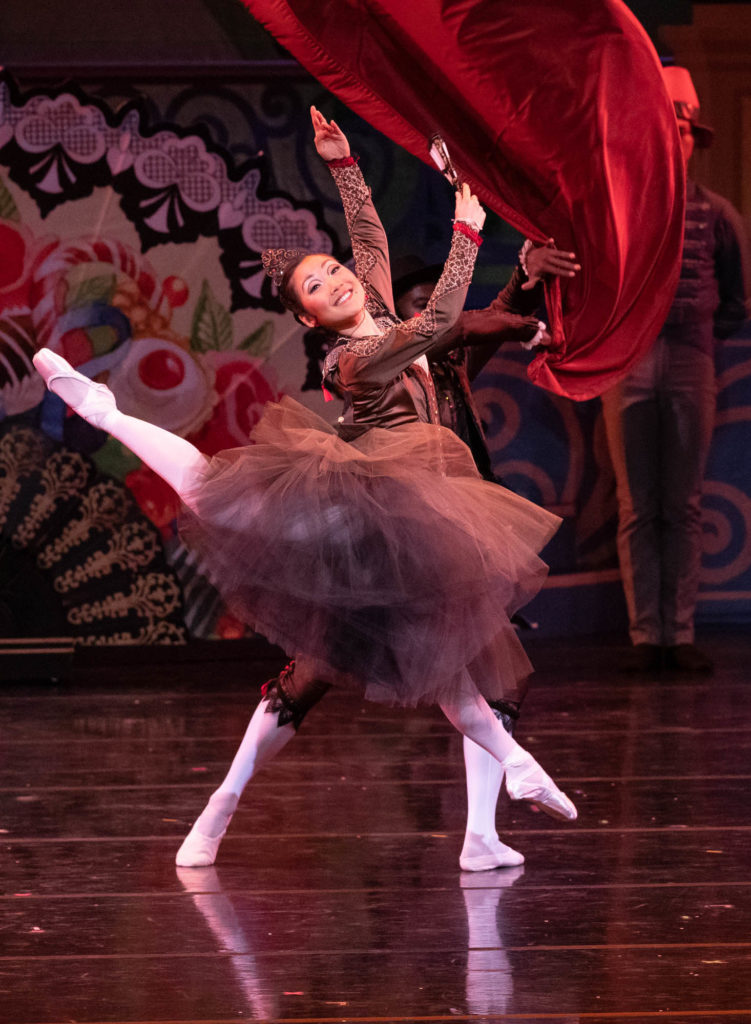 dancer performing a leap during The Nutcracker, a favorite holiday event in Kansas City