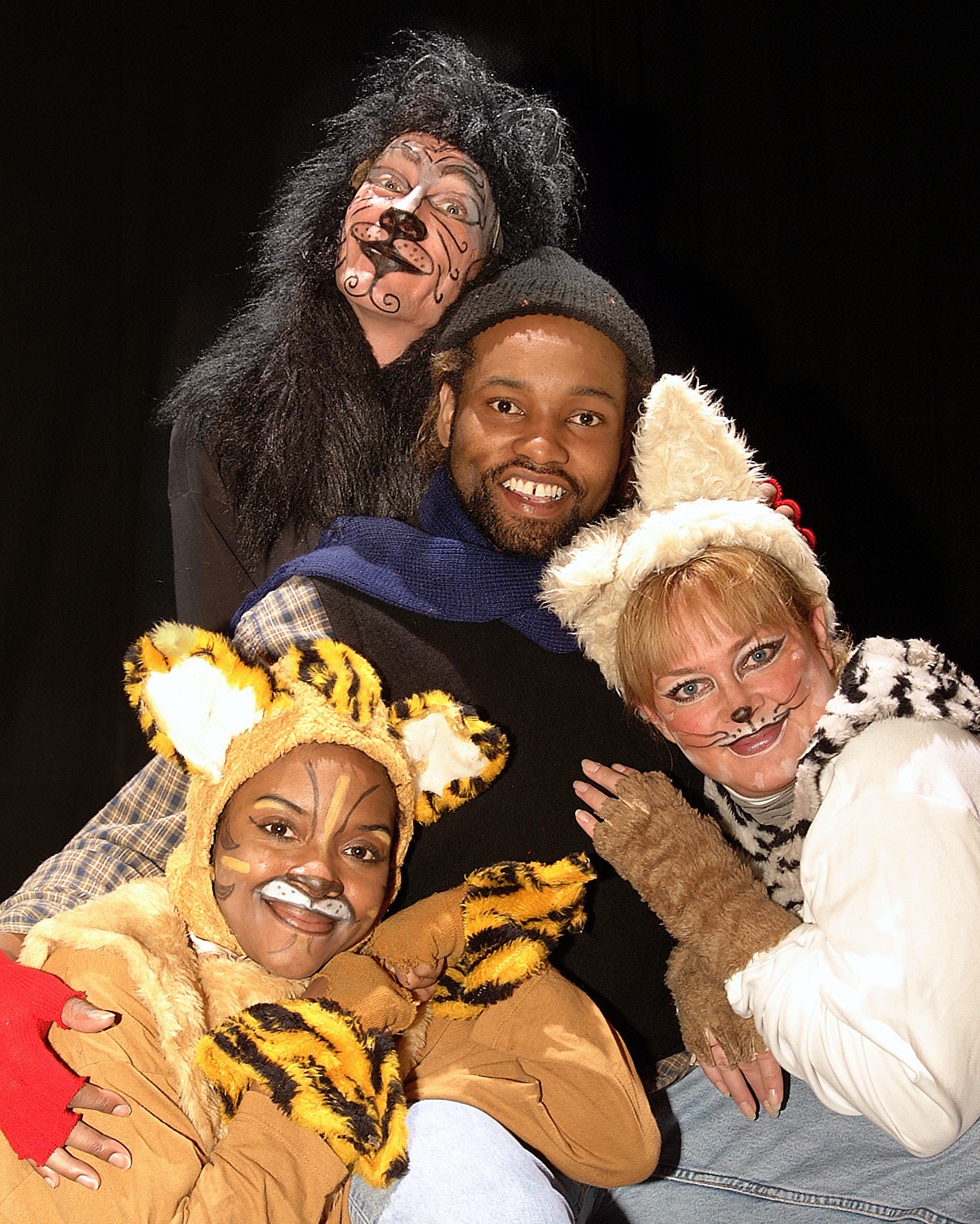 Photo for Three Wisecats on Broadway. Shows cast members in cat costumes.