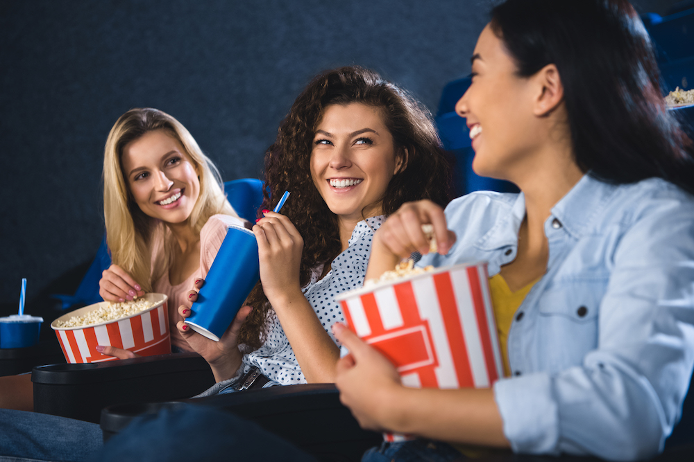 group of women watching a movie at the best movie theater in kansas city